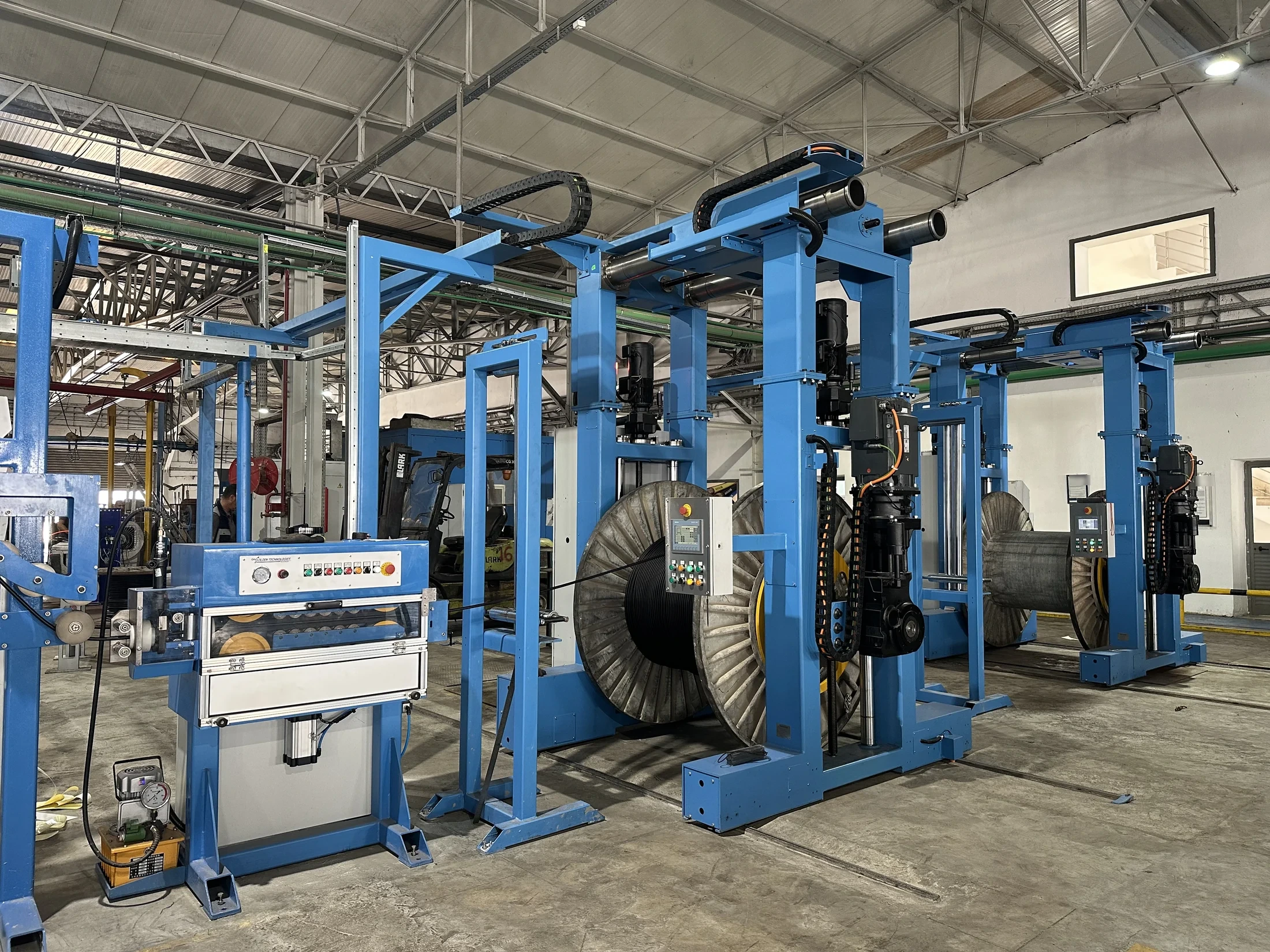 Retrofitted caterpillar and twin take-up sections on a power-cable production line in Tunisia